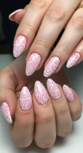 1. Pastel Pink Swirl Nails