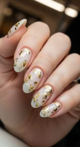 Milky White Nails with Gold Flakes