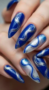 2. Royal Blue Swirl Nails