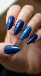 5. Blue Glitter Accent Nails
