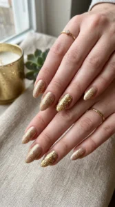 2. Sandy Gold Sparkle Nail Ideas