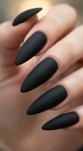 1. Matte Black Stiletto Nails