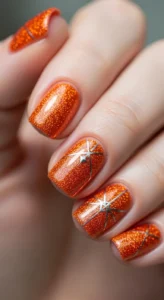 Glittery Orange Accent Nails