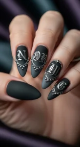 7. Gothic Lettering Accent Nails