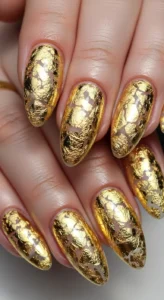 Bold Gold Flake Almond Nails