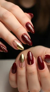 Maroon Nails with Gold Accents